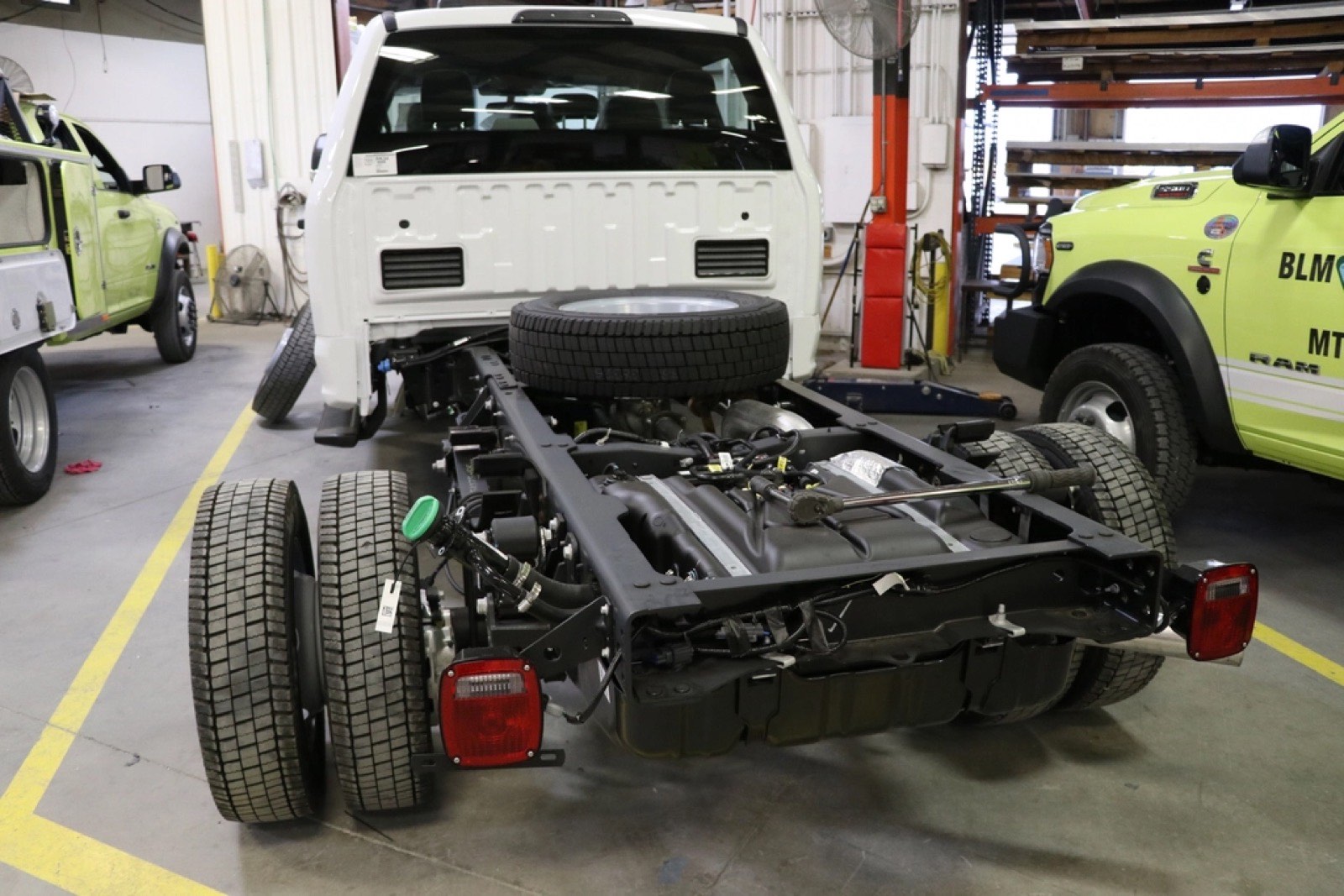 Semi trucks being serviced in a repair shop